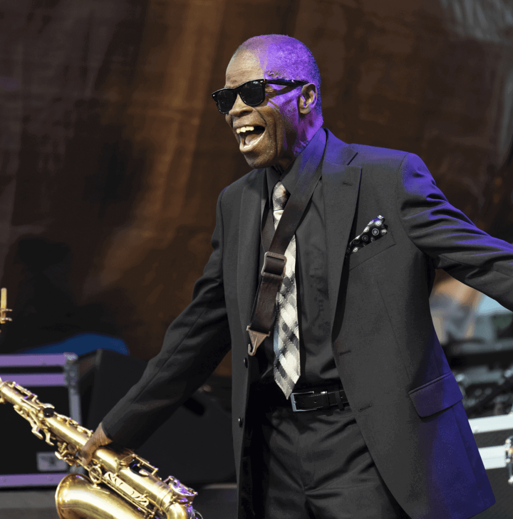 man playing saxophone concert photo