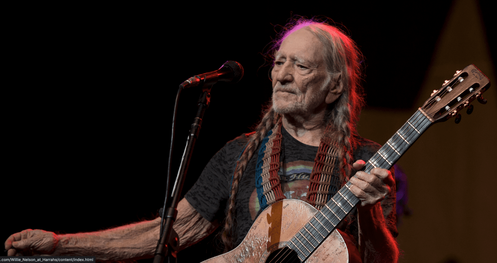 willie nelson playing live guitar