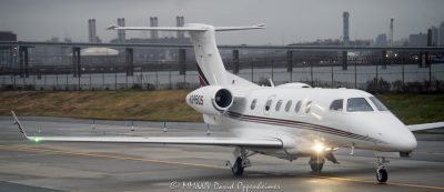 Embraer Phenom 300 jet aircraft N395QS at LaGuardia Airport in New York City - © 2024 David Oppenheimer - Performance Impressions aviation photography archives - https://performanceimpressions.com Embraer Phenom 300, Phenom 300, 300E, Embraer, jet, N395QS, airplane, aircraft, private jet, aviation, airplane, NetJets Aviation, NetJets, NetJets Sales, 1I395, 50500365, LGA, airport, tarmac, taxiing, Embraer Executive Aircraft, fractional jet, fractional, fractional ownership, travel, jetset, New York, KLGA, runway, Queens, New York City, NYC, David Oppenheimer, color, horizontal, United States, 1-13985601741,