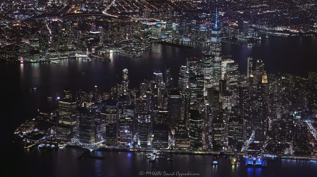 Lower Manhattan and the Financial District skyline in New York City at night aerial view - © 2024 David Oppenheimer - Performance Impressions aerial photography archives - https://performanceimpressions.com Lower Manhattan, Manhattan, Downtown Manhattan, Downtown New York City, Downtown NYC, Downtown, New York Harbor, SOHO, Tribeca, Financial District, Seaport, Two Bridges, Lower East Side, Manhattan aerial, East River, Hudson River, NYC aerial, One World Trade Center, 1 WTC, Jersey City, Civic Center, NYC Financial District, skyscrapers, skyline, landscape, cityscape, Hilton Garden Inn NYC Financial Center, Financial Center, finance, financial center, 2 American Express Plz, American Express Plz, 55 Water Street, 32 Old Slip, Old Slip Plaza, 111 Wall Street, Wall Street, 120 Wall Street, 70 South St, aerial, aerial view, aerial photographer, aerial photography, David Oppenheimer, color, horizontal, United States, 1-13985601741,