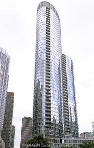 465 North Park luxury apartment tower in Chicago, Illinois, located in the Streeterville neighborhood near Navy Pier and the Chicago lakefront. Contemporary residential high-rise architecture designed by Pappageorge Haymes Partners featuring a curved glass facade, balconies, retail space, and a four-story podium. The 48-story rental apartment building was developed by Jupiter Realty with MetLife and Allstate, and completed in 2018 – © 2026 David Oppenheimer – Performance Impressions photography archives https://performanceimpressions.com 465 North Park, 465 North Park Drive, 465 N Park, 465 N Park Drive, North Park Drive, Park Drive, Streeterville, Chicago, Chicago Illinois, Illinois, United States, 60611, Downtown Chicago, Chicago Loop, Navy Pier, Lake Michigan, Chicago lakefront, architecture, Chicago architecture, architectural photography, urban architecture, modern architecture, contemporary architecture, residential architecture, apartment tower, apartment building, rental apartments, luxury apartments, residential tower, residential building, high-rise, skyscraper, building, tower, glass tower, glass building, glass facade, curved glass, curved facade, curtain wall, balconies, balcony, podium, retail space, mixed-use building, residential real estate, apartment real estate, Chicago real estate, real estate, downtown apartments, Streeterville apartments, Chicago apartments, luxury rentals, urban living, city living, commercial architecture, downtown, urban, iconic building, American architecture, Illinois architecture, exterior, daylight, waterfront, business district, residential high-rise, multifamily housing, Pappageorge Haymes, Pappageorge Haymes Partners, Jupiter Realty, MetLife, Allstate, Power Construction, LEED Gold, commercial photography, commercial imagery, image licensing, licensing, photography licensing, David Oppenheimer, facade, vertical, 1-15156784411