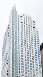 500 West Monroe office tower in Chicago, Illinois, located in the West Loop near Union Station and Ogilvie Transportation Center. Postmodern commercial skyscraper architecture designed by Skidmore, Owings & Merrill featuring a granite and glass exterior, stepped massing, reflective facade, and a distinctive turret-like crown. The 45-story office building was completed in 1992 and was formerly known as the Heller International Building – © 2026 David Oppenheimer – Performance Impressions photography archives https://performanceimpressions.com 500 West Monroe, 500 West Monroe Street, 500 W Monroe, West Monroe Street, Monroe Street, Heller International Building, Heller International Tower, Chicago, Chicago Illinois, Illinois, United States, 60661, Downtown Chicago, West Loop, Chicago Loop, Union Station, Ogilvie Transportation Center, architecture, Chicago architecture, architectural photography, facade, building exterior, exterior, postmodern architecture, modern architecture, contemporary architecture, postmodern skyscraper, skyscraper, high-rise, office tower, building, tower, office building, commercial building, corporate tower, corporate headquarters, commercial real estate, corporate real estate, real estate, business district, financial district, commercial architecture, corporate architecture, downtown, urban, glass tower, glass building, glass facade, reflective glass, granite facade, granite exterior, curtain wall, stepped tower, turret crown, illuminated crown, crown, iconic building, American architecture, Illinois architecture, daylight, financial center, business center, Class A office building, Chicago skyscraper, Chicago office tower, downtown office tower, commercial tower, office architecture, Loop district, West Loop architecture, Skidmore Owings Merrill, Skidmore Owings and Merrill, SOM, Tishman Speyer, Spear Street Capital, JLL, commercial photography, commercial imagery, image licensing, licensing, photography licensing, David Oppenheimer, vertical, 1-15156784411