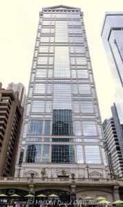 77 West Wacker Drive office tower in downtown Chicago, Illinois, located along the Chicago River in the Loop business district. Contemporary commercial skyscraper architecture featuring reflective glass design and prominent riverfront positioning. - © 2026 David Oppenheimer - Performance Impressions photography archives https://performanceimpressions.com 77 West Wacker, 77 West Wacker Drive, 77 W Wacker, West Wacker Drive, Wacker Drive, RR Donnelley Building, ADM Headquarters, Ricardo Bofill, Ricardo Bofill Architecture, Ricardo Bofill Taller de Arquitectura, United Building, Prime Group Realty Trust, Cohen-Barreto-Marchertas, Schal Associates, Chicago, Chicago Illinois, Illinois, Downtown Chicago, Chicago Loop, Chicago River, skyline, Chicago Skyline, cityscape, architecture, Chicago architecture, architectural photography, urban architecture, modern architecture, postmodern architecture, contemporary architecture, skyscraper, high-rise, office tower, building, tower, office building, commercial building, corporate tower, commercial real estate, corporate real estate, real estate, business district, financial district, commercial architecture, corporate architecture, downtown, urban, riverfront architecture, riverfront tower, glass tower, glass building, glass facade, facade, building exterior, reflections, river reflections, iconic building, landmark, American architecture, Illinois architecture, travel, tourism, destination, city life, metropolitan, urban skyline, exterior, daylight, waterfront, financial center, business center, United States, David Oppenheimer, color, vertical, 1-15156784411,