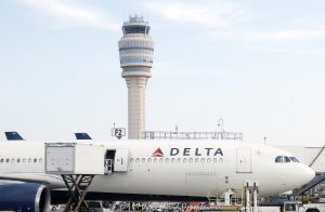 Delta Air Lines Jet and the Air Traffic Control Tower at Hartsfield-Jackson Atlanta International Airport Air traffic control tower at Hartsfield-Jackson Atlanta International Airport in Atlanta, Georgia - © 2024 David Oppenheimer - Performance Impressions aviation photography archives - https://performanceimpressions.com air traffic control, ATC, ATC tower, control tower, tower, ATL, Delta, Delta Air Lines, DAL, plane, Hartsfield-Jackson Atlanta International Airport, Hartsfield-Jackson, KATL, airspace, aviation, aircraft, guidance, air traffic, transportation, airport, airport traffic, Atlanta Tower, radar, ground control, GMC, approach control, approach, terminal, route, control, collision avoidance, weather, runway, navigation, safety, airlines, Ramp 6, IFR, Atlanta, Georgia, tallest, tall, Clayton County, David Oppenheimer, color, horizontal, United States, 1-13726821381