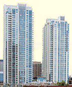 150 North Riverside Plaza oAlta at K Station apartment towers in Chicago, Illinois, located at 555 West Kinzie Street in the Fulton River District between River North and the West Loop. Contemporary residential high-rise architecture by Pappageorge Haymes Partners featuring two modern rental apartment towers, glass facade design, balconies, and downtown residential positioning near the Chicago River. The luxury apartment complex was developed by Fifield Companies and completed in 2010 – © 2026 David Oppenheimer – Performance Impressions photography archives https://performanceimpressions.com Alta Chicago, Alta at K Station, Alta Apartments, Alta apartment towers, Alta rental apartments, Alta Chicago apartments, 555 West Kinzie, 555 West Kinzie Street, 555 W Kinzie, West Kinzie Street, Kinzie Street, Chicago, Chicago Illinois, Illinois, United States, 60654, Downtown Chicago, Fulton River District, River North, West Loop, Chicago Loop, Chicago River, architecture, Chicago architecture, architectural photography, facade, building exterior, exterior, residential architecture, modern architecture, contemporary architecture, urban architecture, apartment tower, apartment building, rental apartments, luxury apartments, residential tower, residential building, two-tower complex, high-rise, skyscraper, building, tower, glass tower, glass building, glass facade, reflective glass, curtain wall, balconies, balcony, podium, retail space, residential real estate, apartment real estate, Chicago real estate, real estate, downtown apartments, River North apartments, West Loop apartments, Chicago apartments, luxury rentals, urban living, city living, mixed-use building, commercial architecture, downtown, urban, iconic building, American architecture, Illinois architecture, daylight, multifamily housing, Pappageorge Haymes Partners, Pappageorge Haymes, Fifield Companies, McHugh Construction, commercial photography, commercial imagery, image licensing, licensing, photography licensing, David Oppenheimer, vertical, 1-15156784411