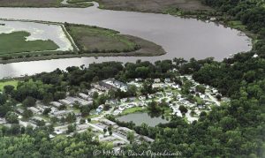 Amberwood Townhomes and the Magnolia Historic Rice Fields on the Ashley River in North Charleston Aerial View Amberwood Townhomes apartment complex at 4995 Lambs Rd and the Magnolia Historic Rice Fields at Magnolia Plantation and Gardens along the Ashley River in North Charleston, South Carolina aerial view - © 2024 David Oppenheimer - Performance Impressions aerial photography archives - https://performanceimpressions.com Amberwood Townhomes, Amberwood, apartments, complex, Ashley River, North Charleston, South Carolina, 29418, 4995 Lambs Rd, Magnolia Historic Rice Fields, Magnolia Rice Fields, rice fields, historic, townhomes, Magnolia Plantation and Gardens, homes, real estate, North Charleston real estate, North Charleston aerial, Magnolia Gardens, river bend, riverbend, Magnolia, Magnolia Plantation, Lowcountry, river, riverfront, bend, marsh, marshland, aerial photographer, aerial photography, aerial view, aerial, David Oppenheimer, David Gordon Oppenheimer, United States, color, horizontal, 1-13726821381,