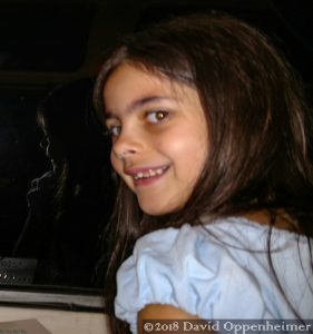 Girl with Reflection in Window on Amtrak Train