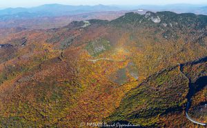 Linn Cove Viaduct on the Blue Ridge Parkway below Grandfather Mountain State Park with Autumn Colors in Western North Carolina Aerial View