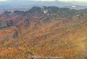 Linn Cove Viaduct on the Blue Ridge Parkway below Grandfather Mountain State Park with Autumn Colors in Western North Carolina Aerial View