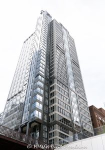 Boeing Building at 100 North Riverside Plaza in Chicago, Illinois, located on the west side of the Chicago River across from the Loop. Postmodern commercial office architecture designed by Perkins and Will featuring a granite and glass facade, vertical setbacks, and a structural system that spans over active railroad tracks near Union Station. The 36-story office building was completed in 1990, was originally known as the Morton-Thiokol International Building, and later served as Boeing’s Chicago headquarters – © 2026 David Oppenheimer – Performance Impressions photography archives https://performanceimpressions.com Boeing Building, Boeing Building Chicago, Boeing International Headquarters, Boeing headquarters, former Boeing headquarters, Boeing Chicago, The Boeing Company, Boeing, 100 North Riverside Plaza, 100 N Riverside Plaza, North Riverside Plaza, Riverside Plaza, Morton-Thiokol International Building, Morton Thiokol Building, Morton Salt, Chicago, Chicago Illinois, Illinois, United States, 60606, Downtown Chicago, Chicago Loop, Chicago River, Chicago riverfront, West Loop, Near West Side, Union Station, Chicago Union Station, architecture, Chicago architecture, architectural photography, facade, building exterior, exterior, postmodern architecture, modern architecture, commercial architecture, corporate architecture, office architecture, office tower, office building, commercial building, corporate tower, corporate headquarters, commercial real estate, corporate real estate, real estate, business district, financial district, downtown, urban, high-rise, skyscraper, building, tower, granite facade, granite exterior, glass facade, reflective glass, curtain wall, vertical setbacks, setback tower, steel trusses, structural system, railroad tracks, rail tracks, air rights, iconic building, American architecture, Illinois architecture, daylight, waterfront, financial center, business center, Class A office building, Chicago skyscraper, Chicago office tower, downtown office tower, commercial tower, Perkins and Will, Perkins+Will, Ralph Johnson, Rubloff, Orient Leasing, commercial photography, commercial imagery, image licensing, licensing, photography licensing, David Oppenheimer, vertical, 1-15156784411