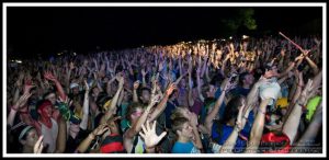 Bonnaroo Music Festival Crowd with Hands in Air at Night