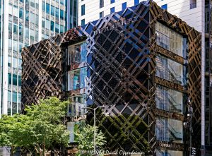 Burberry Michigan Avenue store at 633 North Michigan Avenue in Chicago features a black stainless-steel and fritted-glass facade patterned after the British luxury brand’s signature check. Designed by Callison Barteluce with Solomon Cordwell Buenz as architect of record, the flagship retail building stands at Michigan Avenue and Ontario Street on the Magnificent Mile – © 2026 David Oppenheimer – Performance Impressions photography archives https://performanceimpressions.com Burberry, Burberry Michigan Avenue, Burberry Michigan Avenue Chicago, Burberry Chicago, Burberry store Chicago, Burberry Chicago store, Burberry flagship store, Burberry Chicago flagship, Burberry Michigan Avenue store, Burberry 633 Michigan, 633 North Michigan Avenue, 633 N Michigan Avenue, 633 N Michigan Ave, 633 North Michigan, 633 N Michigan, North Michigan Avenue, Michigan Avenue, East Ontario Street, Ontario Street, Magnificent Mile, Mag Mile, Streeterville, Streeterville Chicago, Near North Side, downtown Chicago, Chicago, Chicago Illinois, Chicago IL, Illinois, 60611, facade, building exterior, exterior, retail facade, storefront, store exterior, Chicago storefront, black facade, stainless steel facade, black stainless steel, polished stainless steel, metal facade, fritted glass, black glass, glass facade, glass wall, curtain wall, check facade, check pattern, Burberry check, Burberry plaid, tartan pattern, plaid pattern, geometric facade, sculptural facade, glass and metal, architectural branding, brand architecture, facade design, signage, Burberry sign, building, retail building, commercial building, store, boutique, flagship store, luxury boutique, fashion boutique, retail store, luxury retail, designer retail, fashion store, luxury shopping, Chicago shopping, Michigan Avenue shopping, Magnificent Mile shopping, shopping, retail, fashion, luxury fashion, designer fashion, British fashion, British luxury, luxury brand, British fashion house, womenswear, menswear, childrenswear, outerwear, trench coat, Burberry trench coat, accessories, real estate, Chicago real estate, commercial real estate, retail real estate, Magnificent Mile real estate, architecture, architectural photography, storefront photography, retail photography, Chicago architecture, retail architecture, commercial architecture, contemporary architecture, modern architecture, Callison Barteluce, Callison Barteluce Architects, Solomon Cordwell Buenz, SCB, Christopher Bailey, Heintges Associates, Zahner, A Zahner Company, Shawmut, Power Construction, Burberry Limited, Burberry Group, Burberry Group plc, Thomas Burberry, Illinois architecture, United States, licensing, image licensing, commercial imagery, photography licensing, art, print, fine art, commercial photography, David Oppenheimer, horizontal, 1-15213827141