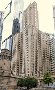 Chicago City Hall and the City Hall-County Building at 121 North LaSalle Street in Chicago, Illinois, located in the Loop civic and financial district. Historic Classical Revival municipal architecture designed by Holabird & Roche featuring a granite facade, large classical columns, and government offices for the City of Chicago and Cook County. The shared City Hall-County Building was completed in phases between 1908 and 1911 and designated a Chicago Landmark in 1982 – © 2026 David Oppenheimer – Performance Impressions photography archives https://performanceimpressions.com Chicago City Hall, City Hall-County Building, City Hall County Building, Chicago City Hall Building, Cook County Building, Cook County government, City of Chicago, Chicago municipal building, Chicago government building, Chicago civic building, 121 North LaSalle, 121 North LaSalle Street, 121 N LaSalle, North LaSalle Street, LaSalle Street, 118 North Clark, 118 North Clark Street, 118 N Clark, Clark Street, Chicago, Chicago Illinois, Illinois, United States, 60602, Downtown Chicago, Chicago Loop, Loop, financial district, civic district, architecture, Chicago architecture, architectural photography, facade, building exterior, exterior, historic architecture, Classical Revival, Classical Revival architecture, neoclassical architecture, municipal architecture, civic architecture, government building, city hall, county building, courthouse building, office building, building, granite facade, stone facade, classical facade, columns, classical columns, Corinthian columns, colonnade, public building, landmark building, Chicago Landmark, historic building, American architecture, Illinois architecture, daylight, downtown, urban, financial center, business center, civic center, Holabird Roche, Holabird & Roche, Holabird and Roche, Holabird Root, Holabird & Root, Chicago City Council, Mayor of Chicago, Cook County Board, Daley Plaza, commercial photography, commercial imagery, image licensing, licensing, photography licensing, David Oppenheimer, vertical, 1-15156784411