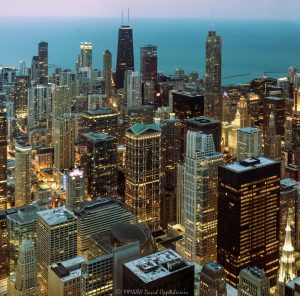 Chicago Skyline and City Lights from Willis Tower Chicago skyline and city lights at night from Willis Tower in Chicago, Illinois, looking north across downtown toward the Magnificent Mile, Gold Coast, and 875 North Michigan Avenue. Elevated nighttime view from the former Sears Tower showing the Chicago Loop, Richard J. Daley Center at 50 West Washington Street, North Michigan Avenue, 900 North Michigan Shops, 360 Chicago, high-rise buildings, illuminated streets, and downtown neighborhoods – © 2026 David Oppenheimer – Performance Impressions aerial photography archives https://performanceimpressions.com Chicago skyline, Chicago skyline at night, Chicago city lights, city lights, night skyline, nighttime skyline, Chicago at night, downtown Chicago, Chicago downtown, Chicago Loop, Loop, financial district, Magnificent Mile, North Michigan Avenue, Michigan Avenue, Gold Coast, Near North Side, River North, Streeterville, 875 North Michigan Avenue, 875 North Michigan, John Hancock Center, former John Hancock Center, 360 Chicago, 360 Chicago Observation Deck, 900 North Michigan, 900 North Michigan Avenue, 900 North Michigan Shops, 50 West Washington, 50 West Washington Street, Richard J. Daley Center, Daley Center, Chicago River, Chicago Riverwalk, Lake Michigan, Chicago lakefront, skyline, cityscape, Chicago cityscape, aerial, aerial photo, aerial photography, aerial photographer, aerial view, aerial image, night aerial, nighttime aerial, night photography, night photo, city at night, urban night, illuminated city, illuminated streets, street lights, building lights, high-rise, high-rises, skyscraper, skyscrapers, building, tower, architecture, Chicago architecture, urban architecture, modern architecture, contemporary architecture, downtown skyline, urban skyline, office towers, residential towers, condo towers, hotel towers, glass towers, glass buildings, city from above, Willis Tower, Sears Tower, former Sears Tower, Skydeck Chicago, 233 South Wacker, 233 South Wacker Drive, 233 S Wacker, Illinois, Chicago Illinois, United States, licensing, image licensing, commercial imagery, photography licensing, art, print, fine art, commercial photography, David Oppenheimer, horizontal, 1-15156784411