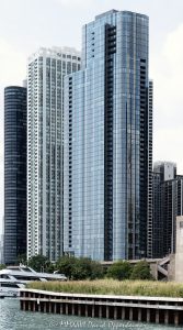 Cirrus Condominiums on Harbor Drive Chicago Lakefront Cirrus Condominiums at 211 North Harbor Drive in Chicago, Illinois, located in Lakeshore East near Lake Michigan, the Chicago River, and DuSable Harbor. Contemporary residential high-rise architecture by bKL Architecture featuring a continuous glass facade, bronze-toned metal panels, balconies, and luxury condominium residences. The view primarily features Cirrus, with nearby 195 North Harbor Drive and 155 Harbor Condominium also visible along the Harbor Drive lakefront – © 2026 David Oppenheimer – Performance Impressions photography archives https://performanceimpressions.com Cirrus Condominiums, Cirrus Chicago, Cirrus, Cirrus condos, Cirrus condominium tower, 211 North Harbor, 211 North Harbor Drive, 211 N Harbor, North Harbor Drive, Harbor Drive, Lakeshore East, Chicago, Chicago Illinois, Illinois, United States, 60601, Downtown Chicago, Chicago Loop, New Eastside, Chicago River, Chicago lakefront, Lake Michigan, architecture, Chicago architecture, architectural photography, facade, building exterior, exterior, residential architecture, modern architecture, contemporary architecture, urban architecture, condominium tower, condominium building, condo tower, condo building, residential tower, residential building, high-rise, skyscraper, building, tower, glass tower, glass building, glass facade, continuous glass facade, bronze panels, metal panels, balconies, balcony, luxury condos, Chicago condos, Lakeshore East condos, downtown condos, residential real estate, condominium real estate, Chicago real estate, real estate, urban living, city living, lakefront living, riverfront architecture, waterfront, downtown, urban, iconic building, American architecture, Illinois architecture, daylight, bKL Architecture, Lendlease, Magellan Development Group, Cascade Park, Cascade Apartments, 195 North Harbor, 195 North Harbor Drive, 155 Harbor, 155 North Harbor, Harbor Point, 155 Harbor Condominium, commercial photography, commercial imagery, image licensing, licensing, photography licensing, art, print, fine art, David Oppenheimer, vertical, 1-15156784411