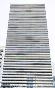 Coast at Lakeshore East Apartment Tower in Chicago Coast at Lakeshore East at 345 East Wacker Drive in Chicago, Illinois, shown in a vertical exterior view of the rectangular glass rental tower with continuous balconies and a high-rise facade. Designed by bKL Architecture with Loewenberg Architects as architect of record and developed by Magellan Development Group, the Lakeshore East apartment building stands near the Chicago River, Lake Michigan, and Millennium Park – © 2026 David Oppenheimer – Performance Impressions photography archives https://performanceimpressions.com Coast at Lakeshore East, Coast Chicago, COAST, Coast Apartments, Coast at Lakeshore East Apartments, 345 East Wacker Drive, 345 E Wacker Drive, East Wacker Drive, Wacker Drive, Lakeshore East, New Eastside, Lakeshore East Chicago, New Eastside Chicago, downtown Chicago, Chicago Loop, Loop Chicago, Chicago, Chicago Illinois, Chicago IL, Illinois, 60601, facade, building exterior, exterior, tower exterior, glass facade, glass tower, glass high rise, rectangular tower, rectangular facade, curtain wall, glass curtain wall, aluminum window wall, translucent glass, fritted glass, Low-E glass, balconies, continuous balconies, glass balconies, glass handrails, horizontal balconies, apartment tower, residential tower, rental tower, high rise, high-rise, skyscraper, tower, building, apartment building, residential building, rental building, mixed-use tower, apartments, rental apartments, luxury apartments, Chicago apartments, downtown apartments, Lakeshore East apartments, New Eastside apartments, urban apartments, multifamily, multifamily housing, residential real estate, apartment real estate, Chicago real estate, Lakeshore East real estate, lakefront real estate, riverfront real estate, commercial real estate, real estate, Chicago River, riverfront, waterfront, lakefront, Lake Michigan, Millennium Park, Lakeshore East Park, Grant Park, DuSable Harbor, Chicago Harbor, architecture, architectural photography, Chicago architecture, residential architecture, high-rise architecture, modern architecture, Chicago modernism, bKL Architecture, bKL Architects, Loewenberg Architects, Magellan Development Group, James McHugh Construction, McHugh Construction, CSA, Mackie Consultants, Wolff Landscape Architecture, JPMorgan Asset Management, American Architecture Award, CTBUH, city views, skyline views, lake views, river views, rooftop deck, outdoor pool, landscaped deck, parking garage, smoke-free building, travel, tourism, destination, United States, licensing, image licensing, commercial imagery, photography licensing, art, print, fine art, commercial photography, David Oppenheimer, vertical, 1-15213827141