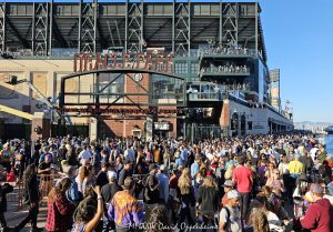 Deadheads at Dead & Company Final Tour at Oracle Park in San Francisco Deadheads at Dead & Company Final Tour at Oracle Park at the Lefty O'Doul Gate by Willie Mays Plaza in San Francisco, California - © 2024 David Oppenheimer - Performance Impressions photography archives - https://performanceimpressions.com Dead & Company, Dead & Company Final Tour, Final Tour, tour, Oracle Park, Grateful Dead, crowd, entrance, enter, stadium, San Francisco, people, fans, deadheads, packed, packed crowd, California, line, SoMA, building, architecture, baseball stadium, 24 Willie Mays Plz, Willie Mays Plaza, 94107, Populous, HOK Sport, HOK Sport Venue Event, outside, O’Doul Gate, Lefty O'Doul Gate, Third Street, gate, concert, concert photography, David Oppenheimer, 1-13985601741,