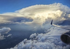 Flying by a Cumulonimbus Supercell Storm Cloud at Altitude Flying by a Cumulonimbus supercell storm cloud with an anvil at altitude - © 2024 David Oppenheimer - Performance Impressions photography archives - https://performanceimpressions.com supercell, supercell storm cloud, Cumulonimbus, anvil, altitude, jet, plane, aerial, aerial view, wall cloud, storm, meteorology, weather, stormy, thunderstorm, cloud, precipitation, flight, fly, travel, air travel, window seat, Delta, Delta Air Lines, DAL, DAL stock, David Oppenheimer, horizontal, square, color, United States, 1-13985601741,