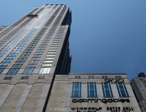Four Seasons Hotel Chicago and Bloomingdale’s at 900 North Michigan Four Seasons Hotel Chicago and Bloomingdale’s at 900 North Michigan Avenue in Chicago, Illinois, shown in a horizontal daytime exterior view of the mixed-use tower and retail base on the Magnificent Mile. The 900 North Michigan Shops frontage includes visible Aster Hall and Topgolf Swing Suite signage beneath the hotel, office, retail, and residential high-rise designed by Kohn Pedersen Fox with Perkins & Will – © 2026 David Oppenheimer – Performance Impressions photography archives https://performanceimpressions.com Four Seasons Hotel Chicago, Bloomingdale’s, Bloomingdale’s Chicago, 900 North Michigan, 900 North Michigan Avenue, 900 N Michigan Avenue, 900 N Michigan, 900 North Michigan Shops, 900 Shops, 900 North Michigan Building, Bloomingdale’s Building, Four Seasons, Four Seasons Hotels and Resorts, Macy’s Inc, Aster Hall, Aster Hall Chicago, Topgolf Swing Suite, Topgolf, Topgolf Swing Suite 900, North Michigan Avenue, Michigan Avenue, Magnificent Mile, Mag Mile, Gold Coast, Gold Coast Chicago, Near North Side, Streeterville, downtown Chicago, Chicago, Chicago Illinois, Chicago IL, Illinois, 60611, facade, building exterior, exterior, tower exterior, hotel exterior, retail facade, storefront, retail frontage, street level retail, mixed-use tower, mixed-use building, hotel tower, luxury hotel, luxury tower, shopping center, shopping mall, retail tower, office tower, residential tower, condominium tower, condo tower, high rise, skyscraper, tower, building, limestone facade, green glass, glass facade, vertical bays, setbacks, lantern crown, postmodern architecture, luxury shopping, Chicago shopping, retail, shopping, department store, food hall, sports simulator, golf simulator, luxury retail, hotel, hospitality, travel, tourism, destination, business travel, architecture, architectural photography, Chicago architecture, commercial architecture, retail architecture, hotel architecture, high-rise architecture, real estate, Chicago real estate, Magnificent Mile real estate, hotel real estate, retail real estate, commercial real estate, residential real estate, window washing, window washers, window washing platform, building maintenance unit, suspended scaffold, facade maintenance, daytime, daylight, Kohn Pedersen Fox, KPF, Perkins & Will, Perkins+Will, Urban Investment & Development Company, Urban Retail Properties, J.A. Jones Construction, Four Seasons Hotel, 132 East Delaware Residences, Equinox, Gucci, MaxMara, Sur La Table, Aritzia, Rush Street, East Delaware Place, 120 East Delaware Place, United States, licensing, image licensing, commercial imagery, photography licensing, art, print, fine art, commercial photography, David Oppenheimer, horizontal, 1-15213827141