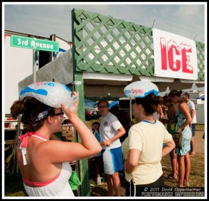 Reddy Ice - Girls Wearing Ice Bag Hats - 2010 Bonnaroo Music Festival Photos - © 2011 David Oppenheimer