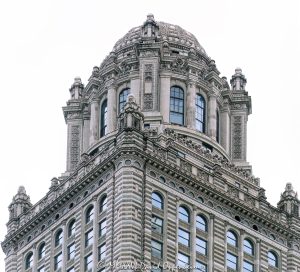 Jewelers Building Chicago Architecture Jewelers Building at 35 East Wacker Drive in Chicago, Illinois, showing the ornate terra cotta exterior, upper tower, and historic skyscraper architecture in the Loop. Also known as 35 East Wacker, the building was formerly the Pure Oil Building and North American Life Building – © 2026 David Oppenheimer – Performance Impressions photography archives https://performanceimpressions.com Jewelers Building, 35 East Wacker, 35 East Wacker Drive, 35 E Wacker Dr, Jewelers Building Chicago, 35 East Wacker Chicago, Pure Oil Building, North American Life Building, North American Life Insurance Building, Chicago Loop, Loop Chicago, East Wacker Drive, Wacker Drive, Chicago architecture, Chicago skyscraper, historic skyscraper, terra cotta, ornate exterior, upper tower, building exterior, exterior, facade, historic architecture, classical revival architecture, neoclassical architecture, Chicago Landmark, downtown Chicago, Cook County, Illinois, Joachim Giaver, Frederick P Dinkelberg, Thielbar and Fugard, high rise, office building, commercial building, architecture, building, skyscraper, landmark, urban architecture, city architecture, architectural detail, windows, decorative masonry, ornamental detail, stonework, vertical architecture, Midwest, United States, 60601, Licensing, image licensing, commercial imagery, photography licensing, art, print, fine art, commercial photography, David Oppenheimer, vertical, 1-15156784411