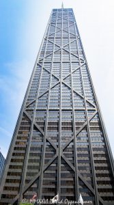 John Hancock Center at 875 North Michigan Avenue in Chicago 875 North Michigan Avenue, formerly the John Hancock Center, rises above the Magnificent Mile in Chicago, Illinois, with a tapered black facade defined by exposed steel X-bracing. Designed by Skidmore, Owings & Merrill through the collaboration of architect Bruce Graham and structural engineer Fazlur Rahman Khan, the mixed-use tower expresses its wind-resisting diagonalized tube directly on the exterior – © 2026 David Oppenheimer – Performance Impressions photography archives https://performanceimpressions.com John Hancock Center, John Hancock Center Chicago, 875 North Michigan Avenue, 875 N Michigan Avenue, 875 N Michigan Ave, 875 North Michigan, 875 N Michigan, John Hancock Building, John Hancock Tower, former John Hancock Center, Big John, 360 Chicago, 360 Chicago Observation Deck, John Hancock Observatory, TILT, CloudBar, Signature Room, Signature Lounge, North Michigan Avenue, Michigan Avenue, Magnificent Mile, Mag Mile, East Delaware Place, East Chestnut Street, Near North Side, Streeterville, downtown Chicago, Chicago, Chicago Illinois, Chicago IL, Illinois, 60611, facade, building exterior, exterior, tower exterior, upper tower, X-bracing, X braces, cross bracing, diagonal bracing, steel bracing, bracing, exposed structure, structural frame, structural steel, steel, structure, black steel, black facade, dark facade, glass facade, curtain wall, glass, tapered facade, tapered tower, trusses, steel trusses, trussed tube, tubular structure, diagonalized tube, exterior tube, wind bracing, structural engineering, engineering, structural expressionism, architecture, architectural photography, Chicago architecture, modern architecture, modernist architecture, Modernism, midcentury modern, high-tech architecture, Magnificent Mile architecture, skyscraper, supertall, high rise, tower, building, mixed use tower, mixed use building, office tower, residential tower, condominium tower, commercial building, offices, condominiums, condos, residences, retail, observation deck, Chicago skyline, skyline views, lake views, real estate, Chicago real estate, commercial real estate, office real estate, residential real estate, condo real estate, Magnificent Mile real estate, Skidmore Owings Merrill, Skidmore Owings & Merrill, SOM, Bruce Graham, Fazlur Rahman Khan, Fazlur Khan, John Hancock Insurance, John Hancock Mutual Life Insurance Company, Tishman Construction, The Hearn Company, Illinois architecture, United States, licensing, image licensing, commercial imagery, photography licensing, art, print, fine art, commercial photography, David Oppenheimer, vertical, 1-15213827141