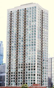 Kinzie Park Tower Chicago Kinzie Park Tower condominium high-rise at 501 North Clinton Street in Chicago, Illinois, showing the modern residential tower exterior and vertical architecture near the Chicago River in downtown Chicago – © 2026 David Oppenheimer – Performance Impressions photography archives https://performanceimpressions.com Kinzie Park Tower, 501 North Clinton Street, 501 N Clinton St, Kinzie Park Tower Chicago, Kinzie Park Chicago, Kinzie Park condominiums, Kinzie Park condos, 501 North Clinton, 501 N Clinton, Chicago condominium tower, Chicago condo tower, Chicago residential tower, Fulton River District, Fulton River District Chicago, River North, River North Chicago, Near North Side, downtown Chicago, Chicago River, North Branch Chicago River, Clinton Street, North Clinton Street, Grand Avenue, building exterior, exterior, facade, architecture, building, tower, residential tower, condominium tower, condo tower, high rise, residential high rise, modern high rise, modern architecture, residential architecture, urban architecture, Chicago architecture, balconies, balcony facade, glass balconies, glass facade, curved facade, rounded corners, windows, walls of windows, concrete, modern residential building, luxury condominiums, residential development, gated community, riverfront community, riverfront residential, private residential community, townhomes, midrise, high-rise condominium tower, 208 units, 34 floors, completed 2001, downtown residential, urban residential, city living, Chicago real estate, Chicago condos, Chicago apartments, condo building, apartment building, multifamily housing, vertical architecture, skyline building, cityscape, street view, ground photo, ground photography, Cook County, Illinois, Midwest, United States, 60654, Licensing, image licensing, commercial imagery, photography licensing, art, print, fine art, commercial photography, David Oppenheimer, vertical, 1-15156784411