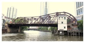 Kinzie Street Bridge over the Chicago River Kinzie Street Bridge crosses the North Branch of the Chicago River at Kinzie Street in downtown Chicago. Built in 1909, the single-leaf bascule highway bridge is a historic river crossing and an example of early 20th-century movable bridge engineering – © 2026 David Oppenheimer – Performance Impressions photography archives https://performanceimpressions.com Kinzie Street Bridge, Kinzie St Bridge, Chicago River Bascule Bridge Kinzie Street, Chicago River, North Branch Chicago River, Kinzie Street, downtown Chicago, Chicago, Illinois, River North, Fulton River District, Near North Side, Near West Side, Wolf Point, Cook County, 60654, 60661, bridge, bascule bridge, single leaf bascule bridge, Chicago bascule bridge, movable bridge, drawbridge, highway bridge, road bridge, truss bridge, Pratt through truss, steel bridge, river bridge, Chicago River bridge, Chicago bridges, historic bridge, historic infrastructure, bridge engineering, urban infrastructure, transportation, street bridge, bridge exterior, waterfront, riverfront, cityscape, urban landscape, Chicago architecture, Chicago engineering, Alexander von Babo, City of Chicago, John J Gallery, Historic American Engineering Record, HAER, United States, Licensing, image licensing, commercial imagery, photography licensing, art, print, fine art, commercial photography, David Oppenheimer, horizontal, 1-15156784411