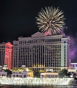 Las Vegas at Night w. Fountains at Bellagio and Caesars Palace Fireworks