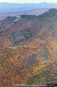 Linn Cove Viaduct on the Blue Ridge Parkway below Grandfather Mountain State Park with Autumn Colors in Western North Carolina Aerial View