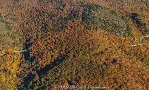 Linn Cove Viaduct on the Blue Ridge Parkway below Grandfather Mountain State Park with Autumn Colors in Western North Carolina Aerial View