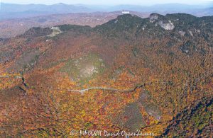 Linn Cove Viaduct on the Blue Ridge Parkway below Grandfather Mountain State Park with Autumn Colors in Western North Carolina Aerial View