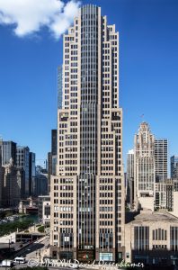 NBC Tower Chicago Art Deco Facade NBC Tower in Chicago, with the Art Deco-influenced postmodern facade and stepped upper tower of Skidmore, Owings & Merrill’s office skyscraper at 455 North Cityfront Plaza Drive. The Cityfront Plaza landmark houses NBC Chicago and WMAQ-TV near the Magnificent Mile and Chicago River – © 2026 David Oppenheimer – Performance Impressions photography archives https://performanceimpressions.com NBC Tower 455 N Cityfront Plaza Dr, NBC Tower, 455 North Cityfront Plaza Drive, 455 N Cityfront Plaza Drive, NBC Tower Chicago, NBC Tower Chicago IL 60611, 454 North Columbus Drive, 454 N Columbus Dr, NBC Tower at Cityfront Plaza, Cityfront Plaza, Cityfront Center, Chicago NBC Tower, NBC Chicago, NBC 5 Chicago, WMAQ-TV, NBCUniversal, Comcast NBCUniversal, Telemundo Chicago, WSNS-TV, Magnificent Mile, Streeterville, Near North Side, downtown Chicago, Chicago River, North Columbus Drive, Cityfront Plaza Drive, facade, building exterior, exterior, architecture, building, tower, office tower, office building, skyscraper, Chicago skyscraper, Chicago architecture, Chicago office tower, postmodern architecture, Art Deco influence, Art Deco inspired, stepped tower, limestone facade, granite facade, glass facade, spire, broadcast tower, media headquarters, television studio, broadcast studio, Skidmore Owings Merrill, SOM, Adrian Smith architect, Tishman Speyer, Metropolis Investment Holdings, Illinois architecture, United States, Licensing, image licensing, commercial imagery, photography licensing, art, print, fine art, commercial photography, David Oppenheimer, vertical, 1-15156784411
