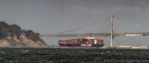 NYL Line Container Ship by Bay Bridge in San Francisco, California