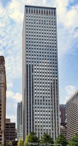 One East Wacker Drive Chicago One East Wacker Drive rises at State Street and Wacker Drive along the Chicago River, showing the modernist office tower’s white marble facade and strong vertical lines in the Loop. Designed by Shaw Metz & Associates, the 41-story skyscraper is also widely known as the Kemper Building and was formerly associated with the Unitrin and United Insurance names – © 2026 David Oppenheimer – Performance Impressions photography archives https://performanceimpressions.com One East Wacker Drive, 1 East Wacker Drive, One East Wacker, 1 E Wacker Drive, 1 E Wacker Dr, One East Wacker Chicago, 1 East Wacker Chicago, Kemper Building, Kemper Building Chicago, Kemper Corporation, Unitrin Building, United Insurance Building, United of America Building, State and Wacker, State Street and Wacker Drive, Chicago Loop, Loop Chicago, downtown Chicago, Chicago Illinois, Chicago IL, East Wacker Drive, Wacker Drive, North State Street, State Street, Chicago River, Chicago Riverwalk, Riverwalk Chicago, Chicago riverfront, riverfront, Marina City area, 60601, facade, building exterior, exterior, white marble facade, marble facade, stone facade, vertical lines, modernist facade, office tower, office building, commercial building, Class A office building, skyscraper, high rise, tower, architecture, architectural photography, Chicago architecture, downtown Chicago architecture, riverfront architecture, modernist architecture, modernism, commercial architecture, Shaw Metz and Associates, Shaw Metz & Associates, Alfred Shaw, Shaw Metz Dolio, Kemper Insurance, corporate tower, business district, financial district, Chicago skyline, Illinois architecture, United States, Licensing, image licensing, commercial imagery, photography licensing, art, print, fine art, commercial photography, David Oppenheimer, vertical, 1-15156784411