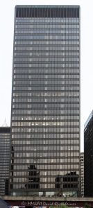 One Illinois Center at 111 East Wacker in Chicago 150 North One Illinois Center at 111 East Wacker Drive in Chicago’s Loop shows the modernist office tower’s bronze-anodized aluminum exterior and tinted-glass curtain wall. Designed by Ludwig Mies van der Rohe for Metropolitan Structures and completed under Joseph Fujikawa of The Office of Mies van der Rohe, the building is also known as 111 East Wacker and was the first tower constructed in the Illinois Center complex – © 2026 David Oppenheimer – Performance Impressions photography archives https://performanceimpressions.com One Illinois Center, One Illinois Center Chicago, One Illinois Center building, 1 Illinois Center, 111 East Wacker, 111 East Wacker Drive, 111 E Wacker Drive, 111 E Wacker Dr, 111 E Wacker, 111 East Wacker Building, Illinois Center, Illinois Center Chicago, Illinois Center complex, Illinois Center office tower, East Wacker Drive, Wacker Drive, Chicago Loop, Loop Chicago, East Loop, downtown Chicago, Chicago Illinois, Chicago IL, 60601, facade, building exterior, exterior, modernist facade, bronze facade, bronze aluminum, anodized aluminum, tinted glass, tinted windows, glass facade, glass curtain wall, curtain wall, steel and glass, exposed columns, office tower, office building, commercial building, commercial office, Class A office, skyscraper, high rise, tower, building, office, commercial, real estate, Chicago real estate, commercial real estate, office real estate, downtown real estate, architecture, architectural photography, Chicago architecture, modern architecture, modernist architecture, Modernism, International Style, Miesian architecture, midcentury modern, commercial architecture, office architecture, Ludwig Mies van der Rohe, Mies van der Rohe, Mies, Mies building, Mies Chicago, Joseph Fujikawa, The Office of Mies van der Rohe, Metropolitan Structures, Chicago Architecture Center, CAC Chicago, Illinois architecture, United States, licensing, image licensing, commercial imagery, photography licensing, art, print, fine art, commercial photography, David Oppenheimer, vertical, 1-15213827141