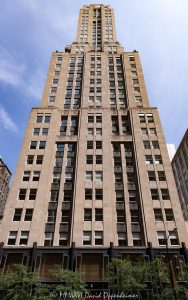 Palmolive Building Art Deco Tower on Michigan Avenue Palmolive Building at 919 North Michigan Avenue rises along Chicago’s Magnificent Mile with a smooth limestone Art Deco facade, tiered setbacks, and the restored Lindbergh Beacon crowning its tapered tower. Designed by Holabird & Root for the Colgate-Palmolive-Peet Company and later known as the Playboy Building, the landmark now combines luxury condominiums with retail space in Chicago, Illinois – © 2026 David Oppenheimer – Performance Impressions photography archives https://performanceimpressions.com Palmolive Building, Palmolive Building Chicago, Palmolive Building Landmark Residences, Palmolive Residences, The Palmolive Condos, Palmolive condos, 919 North Michigan Avenue, 919 N Michigan Avenue, 919 N Michigan Ave, 919 North Michigan, 159 East Walton Place, 159 E Walton Place, 159 E Walton Pl, North Michigan Avenue, Michigan Avenue, Walton Place, Magnificent Mile, Mag Mile, Streeterville, Streeterville Chicago, Near North Side, downtown Chicago, Chicago, Chicago Illinois, Chicago IL, Illinois, 60611, facade, building exterior, exterior, tower exterior, upper tower, limestone facade, stone facade, Bedford limestone, limestone, terra cotta, terra cotta spandrels, Art Deco, Art Deco architecture, Art Deco skyscraper, setback skyscraper, historic architecture, landmark architecture, Chicago architecture, Michigan Avenue architecture, architectural photography, architecture, tiered setbacks, stepped setbacks, stepped tower, tapered tower, sculptural tower, vertical lines, vertical emphasis, geometric facade, geometric design, streamlined facade, ornate facade, beacon, Lindbergh Beacon, Palmolive Beacon, aviation beacon, beacon mast, rooftop beacon, Charles Lindbergh, tower, skyscraper, high rise, building, landmark tower, historic tower, residential tower, condominium tower, mixed-use building, condominiums, condos, luxury condos, luxury residences, residential building, retail space, luxury retail, adaptive reuse, historic preservation, restoration, real estate, Chicago real estate, Streeterville real estate, condominium real estate, residential real estate, luxury real estate, retail real estate, commercial real estate, lake views, skyline views, Chicago skyline, Chicago Landmark, National Register of Historic Places, Playboy Building, former Playboy Building, Playboy Towers, Playboy Enterprises, Playboy magazine, Hugh Hefner, 919 North Michigan Building, Colgate-Palmolive-Peet Company, Colgate-Palmolive Company, Colgate-Palmolive, Palmolive Company, corporate headquarters, historic headquarters, Holabird & Root, Holabird and Root, John Augur Holabird, John Wellborn Root Jr, Gilbert Hall, Booth Hansen, Draper and Kramer, Illinois architecture, American architecture, United States, licensing, image licensing, commercial imagery, photography licensing, art, print, fine art, commercial photography, David Oppenheimer, vertical, 1-15213827141
