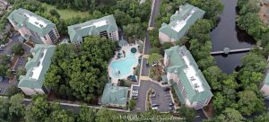 Players Club Resort on Hilton Head Island Aerial View Players Club Resort by Spinnaker Resorts at 35 Deallyon Ave on Hilton Head Island, South Carolina, aerial view - © 2024 David Oppenheimer - Performance Impressions aerial photography archives - https://performanceimpressions.com Players Club Resort, Spinnaker Resorts, 35 Deallyon Ave, pool, building, architecture, villas, condos, apartments, Players Club, furnished, beach, beach access, coast, South Carolina coast, coastal, shoreline, shore, shoreline aerial, waterfront, dunes, sand, beachfront, sand dunes, resort, vacation, vacation homes, beach houses, houses, beach homes, summer, summer homes, residences, properties, Atlantic Ocean, Hilton Head, Hilton Head Island, Town of Hilton Head, South Carolina, coastline, luxury, Lowcountry, Hilton head island real estate, Hilton Head real estate, real estate, Hilton Head aerial, aerial photographer, aerial photography, photography, aerial view, aerial, 29928, David Oppenheimer, David Gordon Oppenheimer, United States, color, horizontal, 1-13726821381,