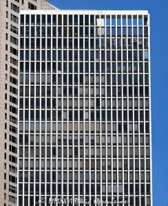 Plaza on DeWitt Condominiums in Chicago Plaza on DeWitt at 260 East Chestnut Street rises in Chicago’s Streeterville neighborhood with a precise grid of travertine-clad concrete columns and tinted windows. Originally the DeWitt-Chestnut Apartments, the Skidmore, Owings & Merrill tower pioneered Fazlur Rahman Khan’s framed-tube structural system before its conversion to condominiums, making the residential high-rise an important work of postwar Chicago engineering – © 2026 David Oppenheimer – Performance Impressions photography archives https://performanceimpressions.com Plaza on DeWitt, Plaza on DeWitt Chicago, Plaza on DeWitt Condominiums, The Plaza on DeWitt, Plaza on Dewitt, 260 East Chestnut Street, 260 E Chestnut Street, 260 E Chestnut St, DeWitt-Chestnut Apartments, DeWitt Chestnut Apartments, DeWitt Chestnut Apartment Building, DeWitt Plaza, North DeWitt Place, DeWitt Place, East Chestnut Street, Chestnut Street, Streeterville, Streeterville Chicago, Near North Side, downtown Chicago, Magnificent Mile, Mag Mile, Lake Michigan, Oak Street Beach, Lake Shore Park, Chicago, Chicago Illinois, Chicago IL, Illinois, 60611, facade, building exterior, exterior, tower exterior, upper tower, travertine facade, travertine marble, travertine cladding, marble facade, stone facade, concrete facade, window grid, concrete grid, tinted windows, tinted glass, anodized aluminum, aluminum windows, closely spaced columns, perimeter columns, reinforced concrete, concrete structure, framed tube, framed-tube system, tube structure, tubular structure, structural system, structural engineering, wind resistance, spandrels, modern architecture, modernist architecture, midcentury modern, postwar architecture, Chicago modernism, residential architecture, high-rise architecture, Chicago architecture, architecture, architectural photography, condominium tower, condo tower, residential tower, residential high rise, condominium building, residential building, condominiums, condos, Chicago condos, Streeterville condos, high rise, skyscraper, tower, building, housing, multifamily, former apartments, condo conversion, real estate, Chicago real estate, Streeterville real estate, condominium real estate, condo real estate, residential real estate, lakefront real estate, Skidmore Owings & Merrill, Skidmore Owings Merrill, SOM, Bruce Graham, Fazlur Rahman Khan, Fazlur Khan, Illinois architecture, United States, licensing, image licensing, commercial imagery, photography licensing, art, print, fine art, commercial photography, David Oppenheimer, vertical, 1-15213827141
