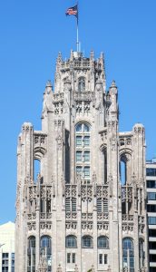 Tribune Tower in Chicago Tribune Tower at 435 North Michigan Avenue in Chicago shows the ornate neo-Gothic tower, limestone facade, Gothic crown, and architectural detailing of the former Chicago Tribune headquarters. Designed by John Mead Howells and Raymond Hood, the landmark tower has been converted into Tribune Tower Residences, a luxury condominium property developed by CIM Group and Golub & Company, with Rowan visible at Michigan Avenue street level – © 2026 David Oppenheimer – Performance Impressions photography archives https://performanceimpressions.com Tribune Tower, Tribune Tower Chicago, Tribune Tower Residences, Tribune Tower condos, Tribune Tower condominiums, 435 N Michigan Ave, 435 North Michigan Avenue, 435 N Michigan Avenue, North Michigan Avenue, Michigan Avenue, Magnificent Mile, Mag Mile, Chicago Loop, Streeterville, downtown Chicago, Chicago Illinois, Chicago IL, 60611, facade, building exterior, exterior, tower, Gothic tower, neo-Gothic tower, ornate tower, limestone facade, stone facade, Gothic facade, neo-Gothic facade, Gothic crown, architectural detail, ornate facade, historic facade, carved stone, buttresses, tracery, skyscraper, high rise, landmark building, Chicago Landmark, historic building, newspaper building, former headquarters, Chicago Tribune, Chicago Tribune Tower, Tribune Company, Tribune Media, Tribune Publishing, WGN Radio, real estate, Chicago real estate, luxury real estate, residential real estate, condominium tower, condo tower, luxury condos, condominiums, luxury residences, residential conversion, adaptive reuse, architecture, architectural photography, Chicago architecture, historic architecture, Gothic architecture, Gothic Revival, neo-Gothic architecture, commercial architecture, residential architecture, John Mead Howells, Raymond Hood, Howells and Hood, Howells & Hood, Rene Paul Chambellan, CIM Group, Golub and Company, Golub & Company, Rowan, Rowan Michigan Ave, Rowan Chicago, Tower District, Michigan Avenue retail, Chicago history, journalism history, Illinois architecture, United States, licensing, image licensing, commercial imagery, photography licensing, art, print, fine art, commercial photography, David Oppenheimer, vertical, 1-15156784411