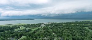 Shelf Cloud Thunderstorm by Harbour Town on Hilton Head Island Aerial View Arcus shelf cloud thunderstorm front squall line over Calibogue Sound by Hilton Head Island, South Carolina aerial view - © 2024 David Oppenheimer - Performance Impressions photography archives - https://performanceimpressions.com shelf cloud, clouds, cloud front, front, storm, wall, thunderstorm, storm front, squall line, arcus, arcus cloud, convection, weather, Hilton Head, Hilton Head Island, Hilton Head aerial, Hilton Head Island aerial, cumulonimbus, air, atmosphere, wind, downdraft, meteorology, Hilton Head storm, Hilton Head Island weather, Hilton Head weather, Hilton Head Island Storm, aviation, flying, turbulence, wind shear, offshore, safety, conditions, helicopter, flight, FAA, NCEP, pilots, FSS, METAR, SPECI, observation, visibility, ceiling, sky, operations, logistics, Calibogue Sound, Buck Island, Broad Creek, Comfort Creek, Lawton, Lawtown Creek, Shark Bank, Bull Island, Daufuskie Island, marsh, marshlands, Long Island, Calibogue Club, Sea Pines, Stoney Creek, Calibogue Club Villas, Sea Loft Villas, Sea Loft, Fairway Oaks Villas, Fairway Oaks, Plantation Club, Plantation Club Villas, Sea Pines Resort, beach, beach access, coast, South Carolina coast, coastal, shoreline, shore, shoreline aerial, waterfront, dunes, sand, beachfront, sand dunes, vacation, vacation homes, beach houses, houses, beach homes, summer, summer homes, residences, properties, Atlantic Ocean, Hilton Head, Hilton Head Island, Town of Hilton Head, South Carolina, coastline, coastline aerial, luxury, Lowcountry, Hilton head island real estate, Hilton Head real estate, real estate, Hilton Head aerial, Harbour Town Lighthouse, Harbour Town, aerial photographer, aerial photography, photography, aerial view, aerial, 29928, David Oppenheimer, David Gordon Oppenheimer, United States, color, horizontal, 1-13726821381,