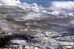 Sierra Nevada Mountains in California with Snow and Clouds Aerial View Sierra Nevada Mountains in California with snow and clouds aerial view - © 2024 David Oppenheimer - Performance Impressions aerial photography archives - https://performanceimpressions.com Sierra Nevada Mountains, Sierra Nevada, Sierra Nevada Mountains aerial, Sierra Nevada Mountain Range, Sierras, snow, clouds, snow cover, summer, snowpack, wilderness, nature, mountains, travel, altitude, mountain range, American Cordillera, watershed, Central Valley, California, beauty, elevation, climate, atmosphere, serene, art, aerial, aerial view, aerial photography, aerial photographer, David Oppenheimer, color, horizontal, United States, 1-13985601741,
