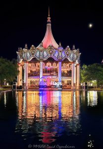 Columbia Carousel Reflection at Six Flags Great America near Chicago Columbia Carousel at Six Flags Great America near Chicago in Gurnee, Illinois, illuminated at night and mirrored across the Carousel Plaza reflecting pool. The entire double-decker carousel and glowing Six Flags Great America sign are reflected in the water, where colorful lights stretch into vertical columns of red, yellow, blue and other colors, creating a symmetrical fine-art view of the landmark amusement park attraction – © 2026 David Oppenheimer – Performance Impressions photography archives https://performanceimpressions.com Columbia Carousel, Columbia Carousel reflection, Six Flags Great America, Six Flags Great America reflection, Six Flags Great America Chicago, Great America Chicago, Six Flags Chicago, Six Flags Illinois, Great America Illinois, Six Flags, Great America, Six Flags sign, Six Flags Great America sign, Great America sign, illuminated sign, park sign, branding, Six Flags branding, Columbia Carousel Chicago, Chicago carousel, Columbia, carousel, carousel reflection, carousel lights, illuminated carousel, carousel night, carousel ride, double-decker carousel, double deck carousel, two-level carousel, merry-go-round, merry go round, classic carousel, carousel attraction, amusement ride, family ride, Carousel Plaza, Six Flags Carousel Plaza, reflecting pool, reflection pool, reflecting pond, mirror reflection, mirrored reflection, water reflection, carousel reflection, reflections, reflection, reflected lights, light reflection, colorful reflection, colorful reflections, symmetrical reflection, symmetry, mirror image, mirrored, water, illuminated, illumination, lights, colored lights, colorful lights, vertical reflections, light columns, colored columns, glowing lights, park lights, amusement park lights, carnival lights, night lights, nighttime, night, evening, after sunset, dusk, amusement park, theme park, amusement parks, theme parks, amusement, attraction, attractions, park attraction, amusement park attraction, theme park attraction, landmark attraction, Gurnee, Gurnee Illinois, Gurnee IL, Illinois, Lake County, Lake County Illinois, northern Illinois, Chicagoland, Chicago area, Chicago, Chicago Illinois, Chicago theme park, Chicago amusement park, Chicago attraction, Chicago attractions, Illinois attraction, Illinois attractions, Gurnee attraction, Midwest, Midwest attraction, Midwest theme park, Midwest amusement park, Chicago tourism, Chicago travel, Chicago trip, Chicago vacation, Visit Chicago, visit Chicago, Illinois tourism, Illinois travel, Visit Illinois, Gurnee tourism, tourist attraction, travel destination, destination, travel, tourism, sightseeing, summer, summer evening, summer night, Great America Parkway, 1 Great America Parkway, Grand Avenue, Route 132, Interstate 94, I-94, 60031, Chance, carousel manufacturer, Marriott’s Great America, Marriotts Great America, Marriott Great America, historic Great America, Six Flags Entertainment Corporation, Six Flags Entertainment, Six Flags company, NYSE FUN, FUN, Six Flags stock, United States, USA, abstract, abstract reflection, abstract lights, abstract photography, geometric, geometry, symmetry photography, reflection photography, night photography, low light photography, carousel photography, amusement park photography, theme park photography, architectural photography, travel photography, tourism photography, editorial photography, fine art photography, Six Flags photography, Great America photography, carousel art, reflection art, abstract art, amusement park art, theme park art, Six Flags art, Great America art, Chicago art, Illinois art, carousel print, reflection print, amusement park print, theme park print, Six Flags print, Great America print, photographic print, fine art print, archival print, gallery print, collector print, wall art, office art, licensing, image licensing, commercial imagery, photography licensing, art, print, fine art, commercial photography, David Oppenheimer, Performance Impressions, Performance Impressions photography archives, horizontal, 1-15213827141