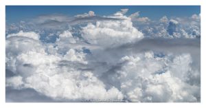 Summer Clouds Aerial View Summer clouds aerial photo showing towering cumulus clouds, developing cumulonimbus formations, and layered cloud tops against blue sky, emphasizing atmospheric texture, convective weather, cloud structure, and high-altitude meteorology – © 2026 David Oppenheimer – Performance Impressions aerial photography archives https://performanceimpressions.com summer clouds aerial photo, summer clouds, clouds aerial view, aerial clouds, cloudscape, cloudscape aerial, cloud formations, cloud tops, cloud layer, towering clouds, cumulus clouds, cumulus, cumulus congestus, cumulonimbus, cumulonimbus clouds, thunderstorm clouds, storm clouds, developing storm, convective clouds, convection, atmospheric convection, weather, meteorology, atmosphere, atmospheric, sky, blue sky, white clouds, cloud texture, cloud structure, cloud field, cloud cover, cloud mass, cloud bank, cloudscape photography, aerial, aerial photo, aerial photography, aerial photographer, aerial view, aerial image, high altitude, altitude, aviation, airplane view, flight, travel, summer weather, weather pattern, weather system, storm development, thunderstorm, rain clouds, moisture, humidity, vapor, water vapor, atmosphere science, weather science, meteorological, natural pattern, nature, outdoors, environment, climate, climate imagery, abstract nature, atmospheric layers, scenic sky, sky photography, United States, licensing, image licensing, commercial imagery, photography licensing, art, print, fine art, commercial photography, David Oppenheimer, horizontal, 1-15156784411