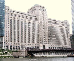 The Mart on the Chicago River The Mart at 222 West Merchandise Mart Plaza faces the Chicago River in River North, with the Franklin–Orleans Street Bridge, the river, and River Park at THE MART visible in the foreground. Designed by Graham, Anderson, Probst & White with Alfred P. Shaw, the Art Deco landmark remains a major Chicago design, showroom, office, and riverfront real estate destination – © 2026 David Oppenheimer – Performance Impressions photography archives https://performanceimpressions.com The Mart, THE MART, Merchandise Mart, Merchandise Mart Chicago, The Mart Chicago, 222 W Merchandise Mart Plaza, 222 West Merchandise Mart Plaza, 222 Merchandise Mart Plaza, W Merchandise Mart Plaza, Merchandise Mart Plaza, Mart Plaza, River North, River North Chicago, downtown Chicago, Chicago Illinois, Chicago IL, 60654, Chicago River, river, riverfront, waterfront, Chicago riverfront, Chicago waterfront, Riverwalk, Chicago Riverwalk, The Jetty, The Mart River Park, River Park at The Mart, River Park, Franklin Orleans Street Bridge, Franklin–Orleans Street Bridge, Franklin Street Bridge, North Orleans Street Bridge, North Franklin Street Bridge, bridge, bascule bridge, Ogilvie Union, Ogilvie Union water taxi, water taxi, boat dock, facade, building exterior, exterior, Art Deco, Art Deco facade, limestone facade, terra cotta, commercial building, office building, showroom building, design center, design showrooms, furniture showrooms, trade showroom, building, architecture, architectural photography, Chicago architecture, Art Deco architecture, commercial architecture, riverfront architecture, real estate, Chicago real estate, commercial real estate, riverfront real estate, Vornado Realty Trust, Vornado, Marshall Field, Marshall Field family, Graham Anderson Probst White, Graham Anderson Probst & White, Alfred P Shaw, Alfred P. Shaw, Marshall’s Landing, Haworth, Chicago design, Chicago history, Illinois architecture, United States, licensing, image licensing, commercial imagery, photography licensing, art, print, fine art, commercial photography, David Oppenheimer, horizontal, 1-15156784411