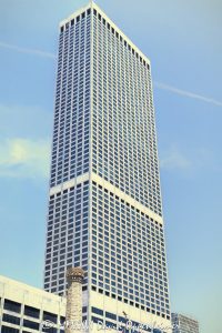 The Ritz-Carlton Chicago Luxury Hotel at Water Tower Place The Ritz-Carlton Chicago, Ritz-Carlton Chicago, Ritz Carlton Chicago, Ritz-Carlton Chicago Hotel, The Ritz-Carlton, Ritz-Carlton Hotels, Ritz-Carlton Hotels and Resorts, The Ritz-Carlton Hotel Company, 160 East Pearson Street, 160 E Pearson Street, 160 E Pearson St, Water Tower Place, Water Tower Place Chicago, 835 North Michigan Avenue, 835 N Michigan Avenue, North Michigan Avenue, Michigan Avenue, Magnificent Mile, Mag Mile, Gold Coast, Gold Coast Chicago, Streeterville, Near North Side, downtown Chicago, Chicago, Chicago Illinois, Chicago IL, Illinois, 60611, facade, building exterior, exterior, tower exterior, hotel exterior, gray marble facade, marble facade, stone facade, gray marble, marble cladding, reflective glass, dark glass, dark windows, window wall, modernist facade, vertical facade, luxury hotel, Chicago hotel, Chicago luxury hotel, Gold Coast hotel, Magnificent Mile hotel, downtown hotel, downtown Chicago hotel, Lake Michigan hotel, business hotel, spa hotel, hotel tower, mixed-use tower, high rise, skyscraper, tower, building, mixed-use building, hotel, hospitality, luxury hospitality, lodging, accommodations, business travel, travel, tourism, Water Tower Place Condominiums, Water Tower Place residences, shopping center, vertical mall, retail, condominiums, modern architecture, modernist architecture, Chicago modernism, hotel architecture, hospitality architecture, commercial architecture, high-rise architecture, Chicago architecture, architecture, architectural photography, reinforced concrete, concrete tower, Edward D Dart, Edward Dart, Loebl Schlossman Bennett & Dart, Loebl Schlossman Bennett and Dart, C F Murphy Associates, Inland Robbins Construction, Urban Investment & Development Company, JMB Realty, Philip Morris Klutznick, Marriott International, Marriott Bonvoy, Marriott, Marriott stock, MAR stock, former Four Seasons hotel, The Ritz-Carlton Chicago A Four Seasons Hotel, Four Seasons Hotels and Resorts, hotel real estate, hospitality real estate, Chicago real estate, Gold Coast real estate, Magnificent Mile real estate, commercial real estate, pale blue sky, low clouds, misty clouds, summer clouds, atmospheric sky, Illinois architecture, United States, licensing, image licensing, commercial imagery, photography licensing, art, print, fine art, commercial photography, David Oppenheimer, vertical, 1-15213827141