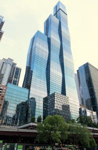 The St. Regis Chicago Glass Tower on the Chicago River The St. Regis Chicago at 401 East Upper Wacker Drive rises above Lakeshore East as a 101-story luxury hotel and condominium tower viewed from the Chicago River. Designed by Jeanne Gang of Studio Gang, its three interconnected volumes and graduated blue-green glass curtain wall create a sculptural profile near Lake Michigan in Chicago, Illinois – © 2026 David Oppenheimer – Performance Impressions photography archives https://performanceimpressions.com The St. Regis Chicago, St. Regis Chicago, The St. Regis Chicago Hotel, St. Regis Hotel Chicago, St. Regis Chicago Residences, The Residences at The St. Regis Chicago, St. Regis Hotels & Resorts, 401 East Upper Wacker Drive, 401 E Upper Wacker Drive, 401 E Wacker Drive, 363 East Wacker Drive, 363 E Wacker Drive, Vista Tower, Vista Tower Chicago, Wanda Vista Tower, Lakeshore East, Lakeshore East Chicago, New Eastside, Chicago Loop, Loop Chicago, downtown Chicago, East Wacker Drive, Upper Wacker Drive, Wacker Drive, Chicago River, Chicago Riverwalk, Riverwalk, riverfront, Lake Michigan, Chicago lakefront, DuSable Harbor, Navy Pier, Millennium Park, Magnificent Mile, Chicago, Chicago Illinois, Chicago IL, Illinois, 60601, facade, building exterior, exterior, tower exterior, upper tower, glass facade, glass tower, glass skyscraper, glass curtain wall, curtain wall, gradient glass, blue-green glass, aqua glass, reflective glass, high-performance glass, faceted facade, geometric facade, undulating facade, sculptural facade, three-volume tower, interconnected volumes, three interconnected towers, frustum, frustum geometry, truncated pyramid, stacked frustums, stepped edges, tapered tower, contemporary architecture, modern architecture, sculptural architecture, high-rise architecture, riverfront architecture, Chicago architecture, architectural photography, luxury hotel, five-star hotel, Chicago hotel, Chicago luxury hotel, downtown hotel, downtown Chicago hotel, riverfront hotel, Lake Michigan hotel, Marriott hotel, hotel tower, hotel, hospitality, luxury hospitality, Marriott Bonvoy, Marriott International, Marriott stock, NASDAQ MAR, MAR stock, mixed-use tower, mixed-use building, condominium tower, residential tower, condominiums, luxury condos, luxury residences, Chicago condos, Lakeshore East condos, skyscraper, supertall, high rise, tower, building, 101-story tower, Chicago skyline, city views, river views, lake views, real estate, Chicago real estate, Lakeshore East real estate, hotel real estate, hospitality real estate, condominium real estate, residential real estate, luxury real estate, riverfront real estate, commercial real estate, Studio Gang, Jeanne Gang, bKL Architecture, bKL Architects, Gensler, HBA, Magnusson Klemencic Associates, MKA, McHugh Construction, Power Construction, OLIN, Magellan Development Group, Gencom, GD Holdings, hotel ownership, hotel investment, daytime, white sky, bright sky, soft light, boat view, river view, Chicago River cruise, architecture cruise, United States, licensing, image licensing, commercial imagery, photography licensing, art, print, fine art, commercial photography, David Oppenheimer, vertical, 1-15213827141