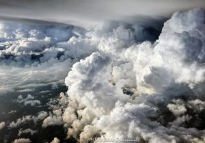 Flying by a Cumulonimbus Supercell Storm Cloud at Altitude Flying by a Cumulonimbus supercell storm cloud with an anvil at altitude - © 2024 David Oppenheimer - Performance Impressions photography archives - https://performanceimpressions.com supercell, supercell storm cloud, Cumulonimbus, anvil, altitude, jet, plane, aerial, aerial view, wall cloud, storm, meteorology, weather, stormy, thunderstorm, cloud, precipitation, David Oppenheimer, summer, summer storm clouds, horizontal, cloud formations, severe weather, wall cloud, Mesocyclone, ceiling, stratospheric cirrus, stratosphere, formation, anvil cloud, high-altitude, extreme weather, Mammatus clouds, Mammatus, overshooting top, atmosphere, color, aerial, aerial view, aerial photography, aerial photographer, United States, 1-13985601741,
