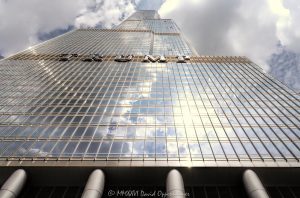 Trump International Hotel and Tower Chicago Trump International Hotel and Tower Chicago at 401 North Wabash Avenue rises in River North, showing the glass and stainless-steel facade of the mixed-use hotel and condominium skyscraper. Designed by Skidmore, Owings & Merrill with Adrian Smith as lead architect and structural engineering by William F. Baker, the tower includes hotel rooms, condominiums, retail space, and parking – © 2026 David Oppenheimer – Performance Impressions photography archives https://performanceimpressions.com Trump International Hotel and Tower Chicago, Trump International Hotel & Tower Chicago, Trump International Hotel and Tower, Trump International Hotel & Tower, Trump Tower Chicago, Trump Tower, Trump Chicago, 401 N Wabash Avenue, 401 North Wabash Avenue, 401 N Wabash Ave, 401 N Wabash, North Wabash Avenue, Wabash Avenue, River North, River North Chicago, Near North Side, downtown Chicago, Chicago Illinois, Chicago IL, 60611, Chicago River, Chicago riverfront, facade, building exterior, exterior, hotel facade, glass facade, stainless steel facade, stainless steel, reflective glass, glass tower, Trump sign, building, tower, hotel tower, condo tower, condominium tower, residential tower, skyscraper, supertall, high rise, mixed use tower, mixed use building, condo hotel, hotel, luxury hotel, five star hotel, condominiums, condos, luxury condos, luxury residences, residences, real estate, Chicago real estate, luxury real estate, hotel real estate, residential real estate, commercial real estate, architecture, architectural photography, Chicago architecture, contemporary architecture, hotel architecture, residential architecture, commercial architecture, Skidmore Owings Merrill, Skidmore Owings & Merrill, SOM, Adrian Smith, William F Baker, William F. Baker, Donald Trump, President Trump, Trump Organization, Bovis Lend Lease, Illinois architecture, United States, licensing, image licensing, commercial imagery, photography licensing, art, print, fine art, commercial photography, David Oppenheimer, horizontal, 1-15156784411